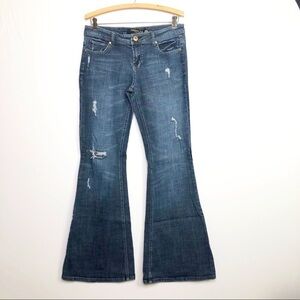 CELEBRITY pink distressed flared jeans